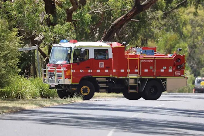 view of NAB signage next to tree